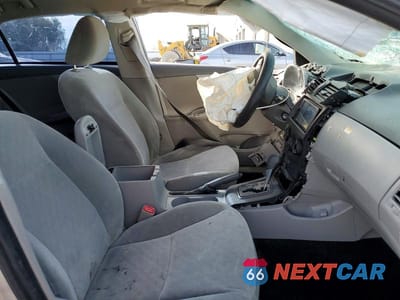 Zdjęcie 7 z 12 samochodu: 2009 TOYOTA COROLLA LE VIN:JTDBL40E69J010901 - miniatura