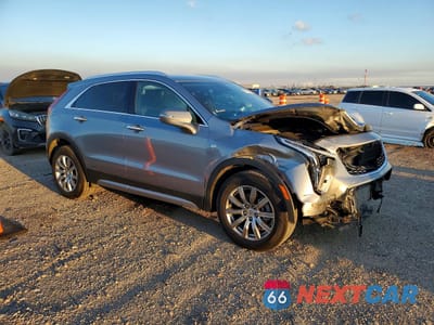 Czwarte zdjęcie samochodu z boku: 2023 CADILLAC XT4 PREMIUM LUXURY VIN:1GYFZDR48PF196798 - miniatura