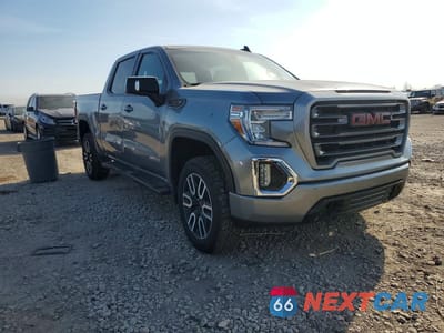 Czwarte zdjęcie samochodu z boku: 2021 GMC SIERRA K1500 AT4 VIN:1GTP9EEL7MZ437158 - miniatura