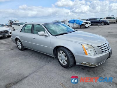 Czwarte zdjęcie samochodu z boku: 2006 CADILLAC DTS VIN:1G6KD57Y66U166128 - miniatura