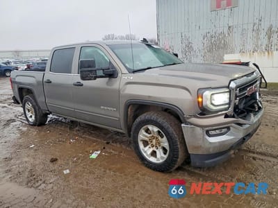 Czwarte zdjęcie samochodu z boku: 2017 GMC SIERRA K1500 SLE VIN:3GTU2MEC0HG234278 - miniatura