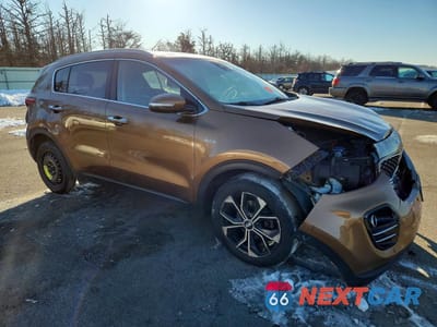 Czwarte zdjęcie samochodu z boku: 2017 KIA SPORTAGE EX VIN:KNDPNCAC7H7152712 - miniatura