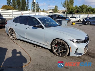 Czwarte zdjęcie samochodu z boku: 2025 BMW M340I VIN:3MW59FT08S8F83742 - miniatura
