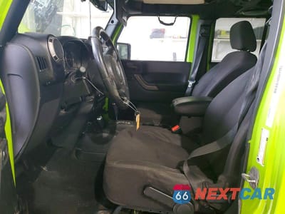 Zdjęcie 7 z 13 samochodu: 2013 JEEP WRANGLER UNLIMITED SPORT VIN:1C4BJWDG0DL511776 - miniatura