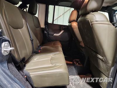 Zdjęcie 11 z 13 samochodu: 2017 JEEP WRANGLER UNLIMITED SAHARA VIN:1C4BJWEG4HL681644 - miniatura