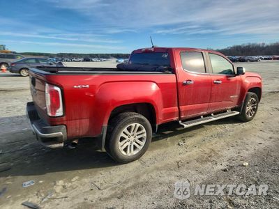 Trzecie zdjęcie samochodu z tyłu: 2015 GMC CANYON SLT VIN:1GTG6CE39F1202517 - miniatura