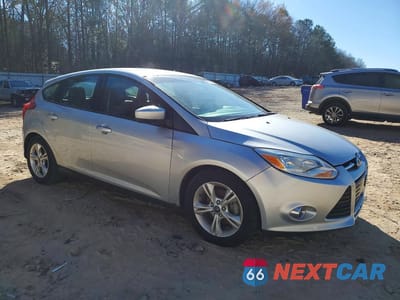 Czwarte zdjęcie samochodu z boku: 2012 FORD FOCUS SE VIN:1FAHP3K25CL346049 - miniatura