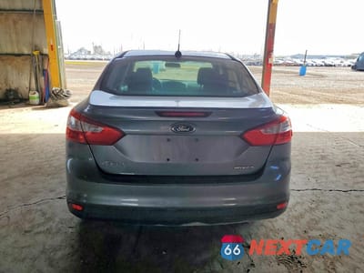 Zdjęcie 6 z 12 samochodu: 2014 FORD FOCUS S VIN:1FADP3E20EL169830 - miniatura