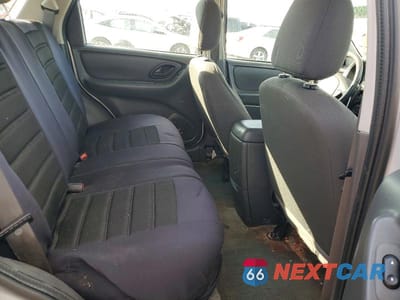 Zdjęcie 11 z 13 samochodu: 2005 FORD ESCAPE XLS VIN:1FMYU02Z05KC43785 - miniatura