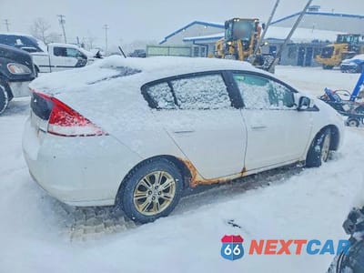 Trzecie zdjęcie samochodu z tyłu: 2010 HONDA INSIGHT EX VIN:JHMZE2H75AS036793 - miniatura