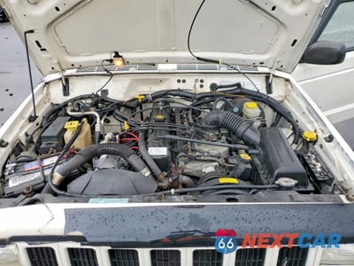 Zdjęcie 12 z 13 samochodu: 1999 JEEP CHEROKEE SPORT VIN:1J4FF68S5XL586943 - miniatura