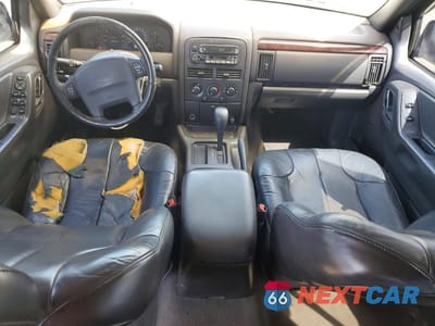 Zdjęcie 8 z 13 samochodu: 2000 JEEP GRAND CHEROKEE LAREDO VIN:1J4G248S7YC134501 - miniatura