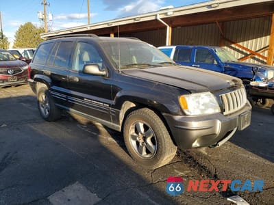 Czwarte zdjęcie samochodu z boku: 2004 JEEP GRAND CHEROKEE LAREDO VIN:1J4GW48S24C279153 - miniatura