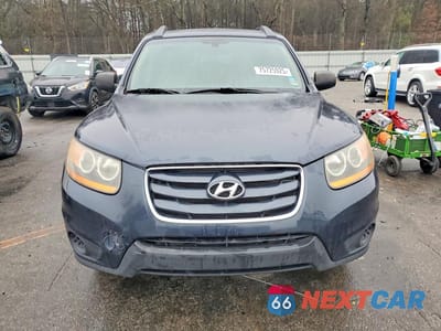 Piąte zdjęcie samochodu w środku: 2011 HYUNDAI SANTA FE GLS VIN:5XYZGDAG5BG083489 - miniatura