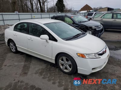 Czwarte zdjęcie samochodu z boku: 2010 HONDA CIVIC VP VIN:2HGFA1F33AH505009 - miniatura