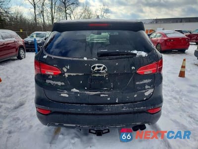 Zdjęcie 6 z 12 samochodu: 2014 HYUNDAI SANTA FE SPORT 2.0T VIN:5XYZU3LA3EG210126 - miniatura