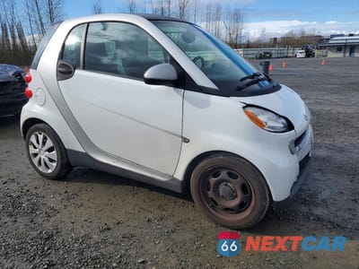 Czwarte zdjęcie samochodu z boku: 2012 SMART FORTWO PURE VIN:WMEEJ3BA7CK577435 - miniatura