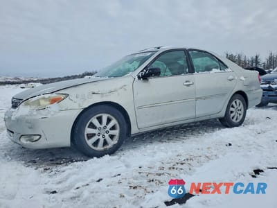 2003 TOYOTA CAMRY LE 4T1BF32K93U551642 - główne zdjęcie licytacji z USA - miniatura