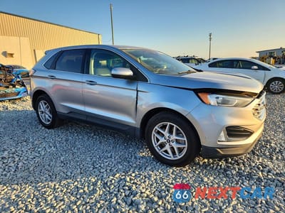 Czwarte zdjęcie samochodu z boku: 2021 FORD EDGE SEL VIN:2FMPK3J92MBA11511 - miniatura