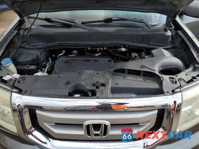 Zdjęcie 12 z 13 samochodu: 2011 HONDA PILOT EXL VIN:5FNYF4H5XBB009849 - miniatura