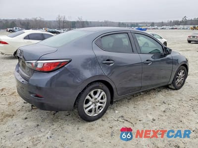 Trzecie zdjęcie samochodu z tyłu: 2016 SCION IA VIN:3MYDLBZV3GY127474 - miniatura