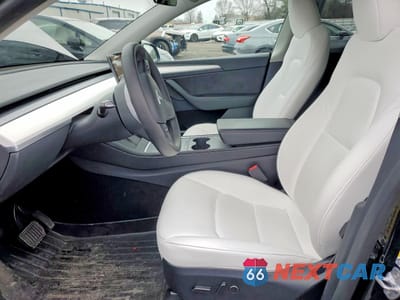 Zdjęcie 7 z 12 samochodu: 2023 TESLA MODEL Y VIN:7SAYGDEE6PF792177 - miniatura