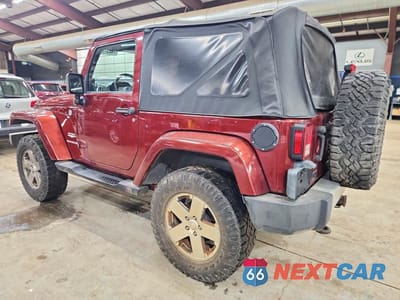 Drugie zdjęcie samochodu z przodu: 2010 JEEP WRANGLER SAHARA VIN:1J4AA5D11AL154583 - miniatura
