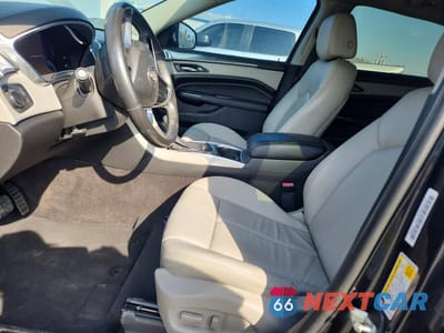 Zdjęcie 7 z 12 samochodu: 2015 CADILLAC SRX VIN:3GYFNAE33FS619840 - miniatura