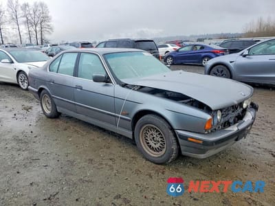 Czwarte zdjęcie samochodu z boku: 1995 BMW 525 I VIN:WBAHD5322SGB39364 - miniatura