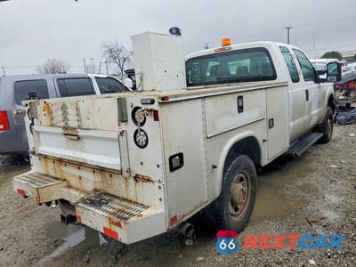 Trzecie zdjęcie samochodu z tyłu: 2015 FORD F250 SUPER DUTY UTILITY / SERVICE TRUCK VIN:1FD7X2B67FEA48335 - miniatura