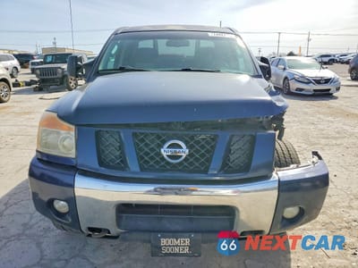 Piąte zdjęcie samochodu w środku: 2011 NISSAN TITAN SV VIN:1N6AA0EC6BN320107 - miniatura