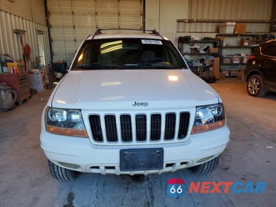 Piąte zdjęcie samochodu w środku: 1999 JEEP GRAND CHEROKEE LAREDO VIN:1J4GW58S6XC508704 - miniatura