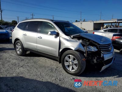 Czwarte zdjęcie samochodu z boku: 2014 CHEVROLET TRAVERSE LT VIN:1GNKRHKD4EJ373189 - miniatura