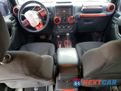 Zdjęcie 8 z 11 samochodu: 2015 JEEP WRANGLER UNLIMITED SPORT VIN:1C4BJWDG5FL735533 - miniatura