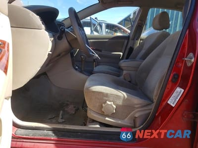 Zdjęcie 7 z 11 samochodu: 2003 TOYOTA COROLLA LE VIN:1NXBR32E93Z063762 - miniatura