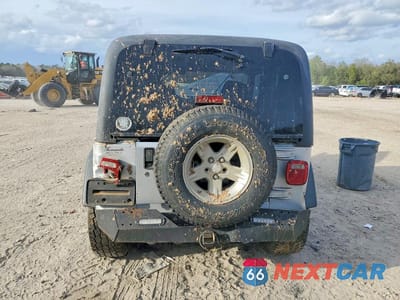 Zdjęcie 6 z 12 samochodu: 2004 JEEP WRANGLER / TJ SPORT VIN:1J4FA49S54P723627 - miniatura