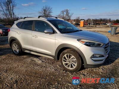 Czwarte zdjęcie samochodu z boku: 2017 HYUNDAI TUCSON LIMITED VIN:KM8J33A46HU484495 - miniatura