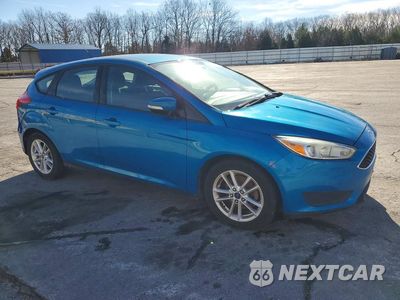 Czwarte zdjęcie samochodu z boku: 2015 FORD FOCUS SE VIN:1FADP3K28FL330141 - miniatura