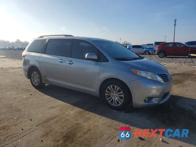 Czwarte zdjęcie samochodu z boku: 2015 TOYOTA SIENNA XLE 8-PASSENGER VIN:5TDYK3DCXFS532445 - miniatura