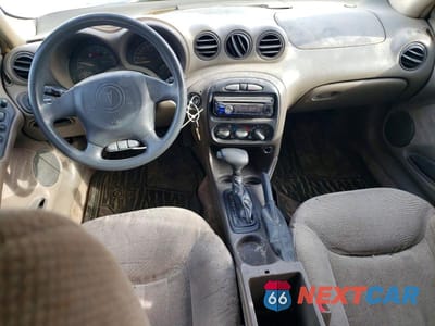 Zdjęcie 8 z 12 samochodu: 1999 PONTIAC GRAND AM SE VIN:1G2NE52E2XC508402 - miniatura