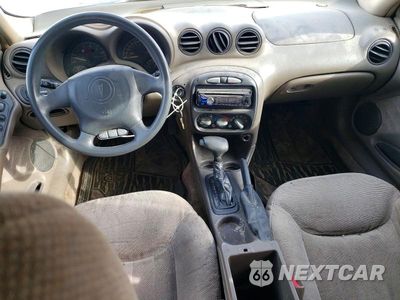 Zdjęcie 8 z 13 samochodu: 1999 PONTIAC GRAND AM SE VIN:1G2NE52E2XC508402 - miniatura