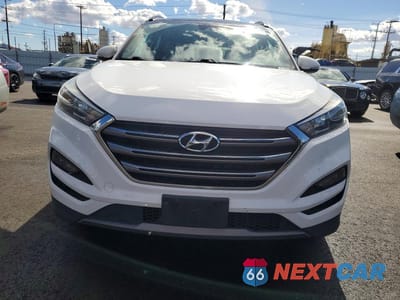 Piąte zdjęcie samochodu w środku: 2016 HYUNDAI TUCSON LIMITED VIN:KM8J33A20GU253072 - miniatura