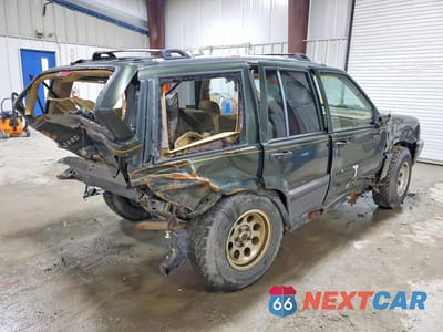 Trzecie zdjęcie samochodu z tyłu: 1995 JEEP GRAND CHEROKEE LAREDO VIN:1J4GZ58S0SC612881 - miniatura