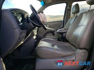 Zdjęcie 7 z 14 samochodu: 2002 MAZDA TRIBUTE LX VIN:4F2YU081X2KM33871 - miniatura