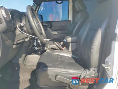 Zdjęcie 7 z 12 samochodu: 2017 JEEP WRANGLER SPORT VIN:1C4AJWAG5HL652347 - miniatura