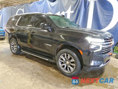 Czwarte zdjęcie samochodu z boku: 2022 CHEVROLET TAHOE K1500 LS VIN:1GNSKMKD0NR285948 - miniatura