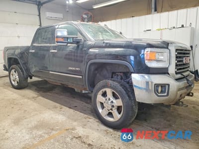 Czwarte zdjęcie samochodu z boku: 2016 GMC SIERRA K2500 SLT VIN:1GT12TEG0GF191447 - miniatura