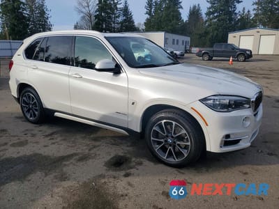 Czwarte zdjęcie samochodu z boku: 2017 BMW X5 XDR40E VIN:5UXKT0C30H0V96985 - miniatura