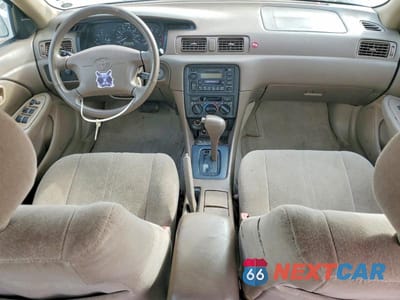 Zdjęcie 8 z 12 samochodu: 1999 TOYOTA CAMRY LE VIN:JT2BG28K7X0350945 - miniatura
