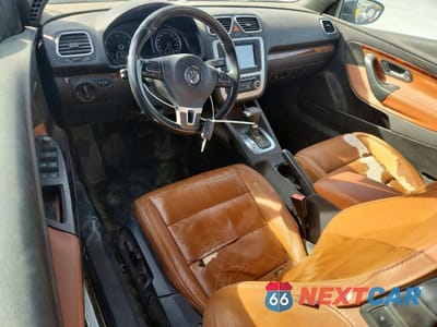 Zdjęcie 8 z 14 samochodu: 2010 VOLKSWAGEN EOS LUX VIN:WVWFA7AH0AV022556 - miniatura